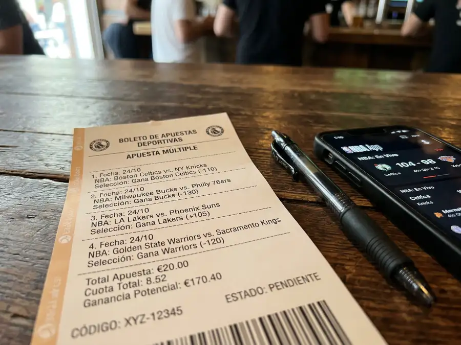 Boleto de apuestas deportivas con varias selecciones de partidos NBA marcadas